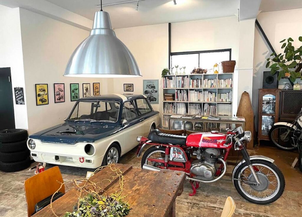Vintage style cafe with vehicles